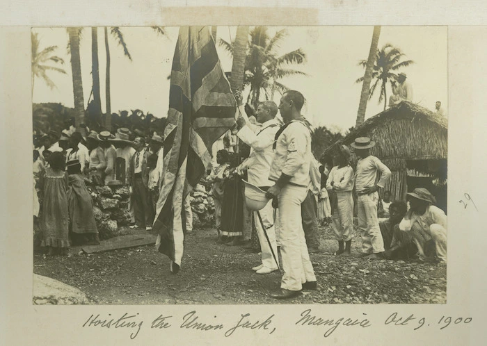 Hoisting the Union Jack at the annexation of Mangaia - Photograph taken by Malcolm Ross.