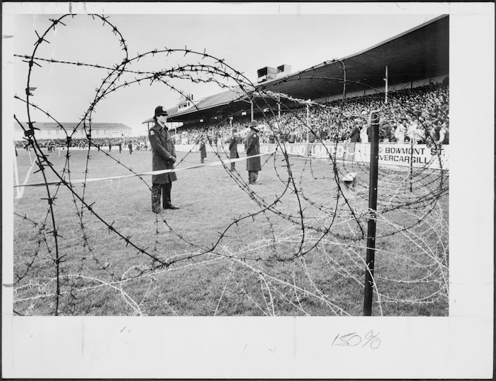 Police and a barbed wire barricade at Invercargill's Rugby Park - Photograph taken by Stuart Menzies