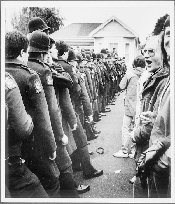 Demonstrators facing a row of police officers - Photograph taken by Ian Mackley