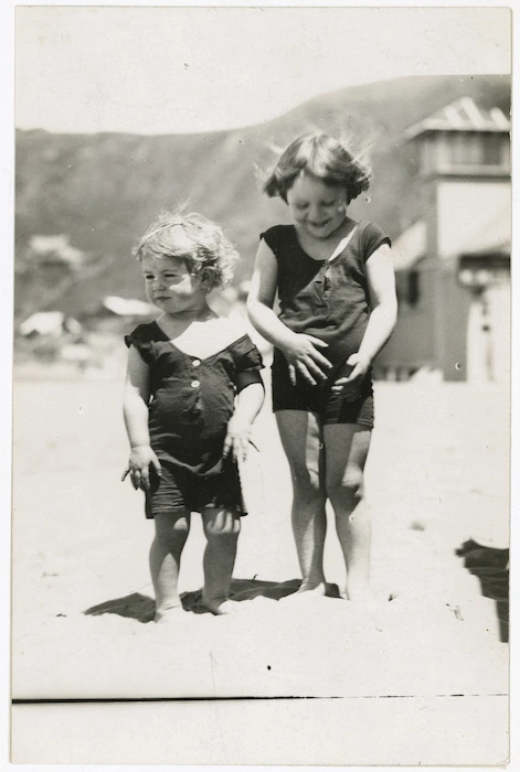 Creator unknown :Photograph of two children in bathing costumes on beach