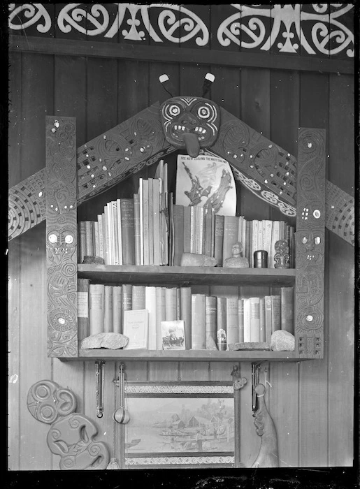 Albert Percy Godber's bookcase with a Maori carving surround