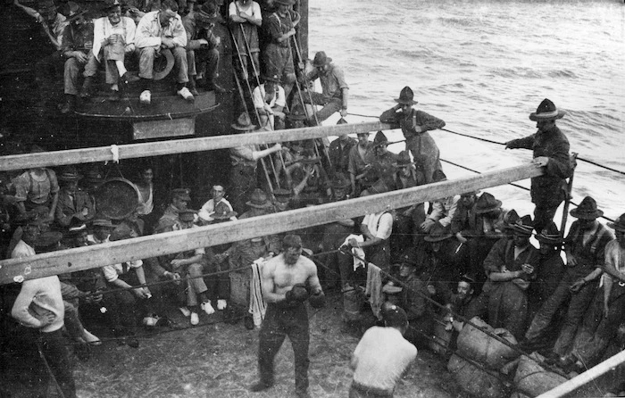 Soldiers watching a boxing match on board ship during World War I