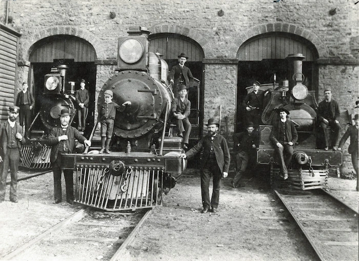 Steam locomotives and railway workers outside a Christchurch engine shed - Photographer unidentified