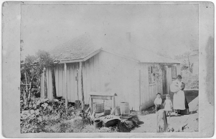 Mrs Samuel Peck and children outside house, Hutt Valley