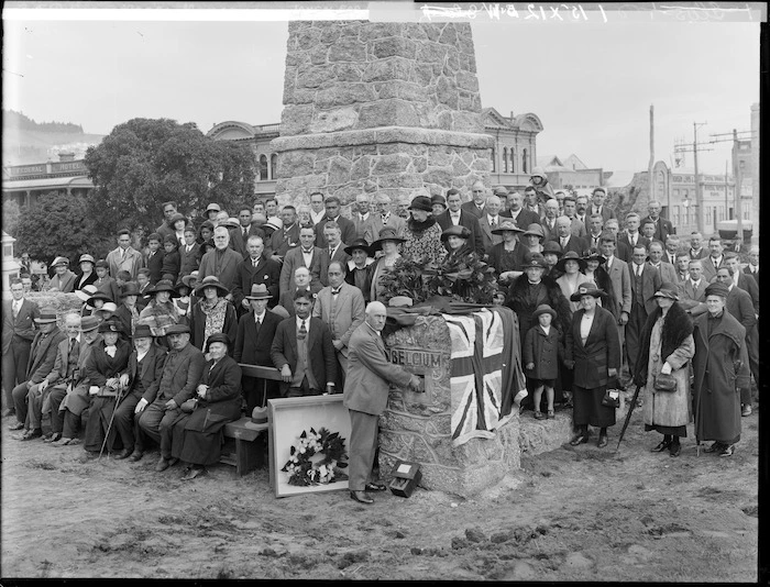 Mayor of Wanganui, Mr Hope Gibbons, placing soil from the battlefields of Belgium in the Maori Memorial - Photograph taken by Frank J Denton