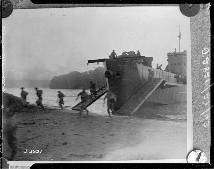 World War II soldiers landing on Mono Island, Treasury Islands, Solomon Islands, while under fire