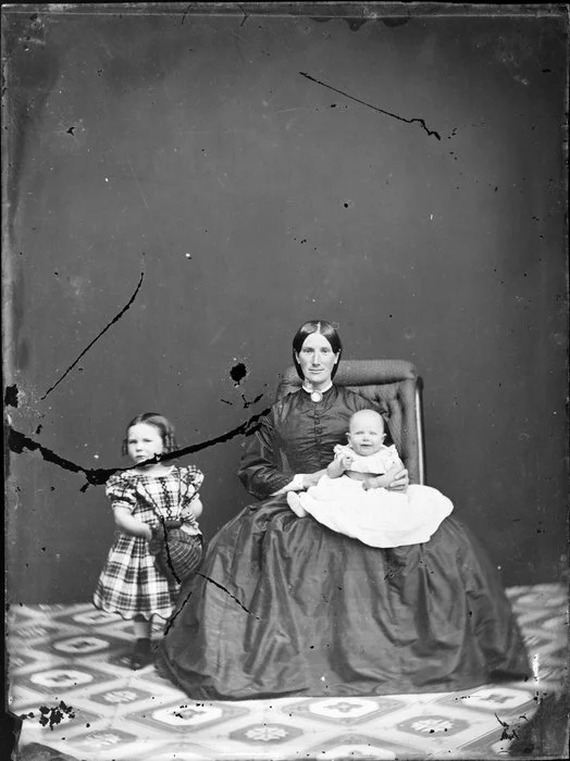 Unidentified mother and children