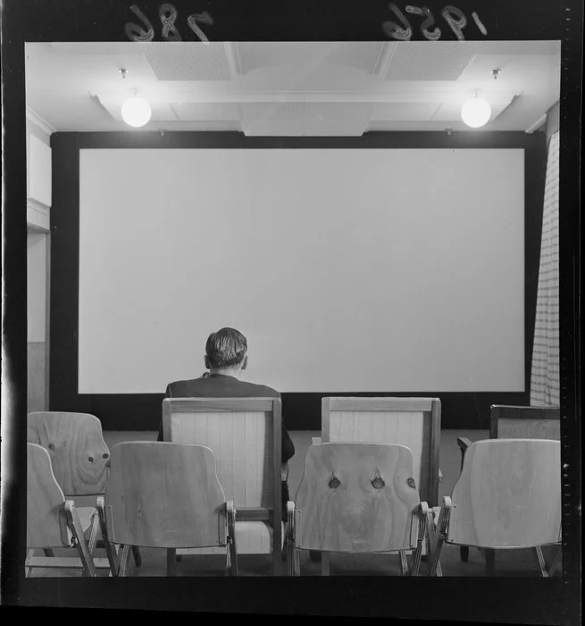 Unidentified man in the screening room of the Film Censor's Office