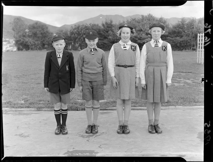 Karori School children displaying new boys and girls uniforms