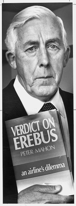 Former High Court judge, and Head of the Commission of Enquiry into the Erebus disaster, Peter Mahon, with his book Verdict on Erebus - Photograph taken by Ray Pigney