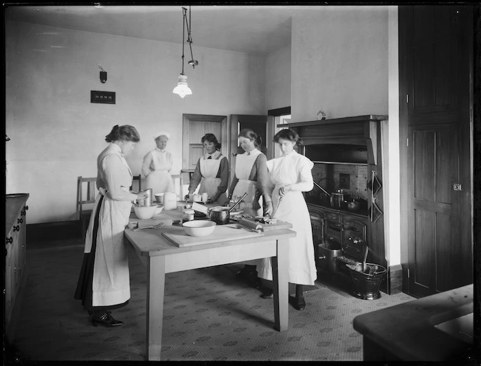 Young housemaids cooking, probably Christchurch region