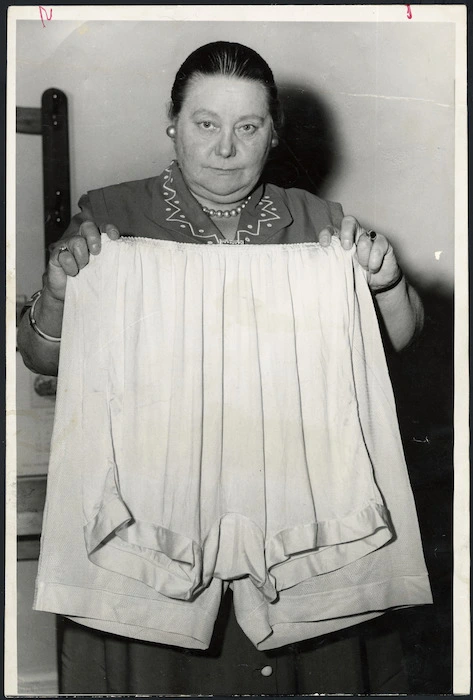 Member of Parliament, Mabel Howard, demonstrating that oversize bloomers vary in size
