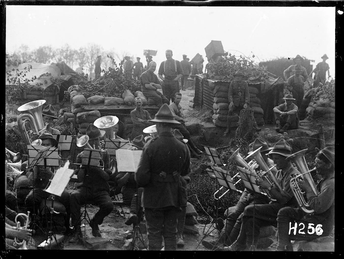 A brass band playing at the New Zealand Rifle Brigade's camp near Ypres, World War I