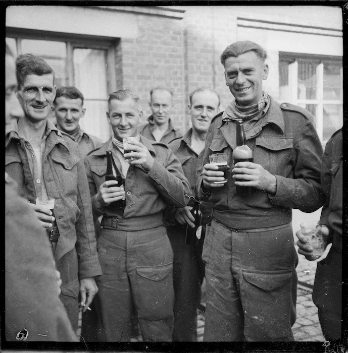 Liberated New Zealand prisoners of war celebrating freedom - Photograph taken by Lee Hill