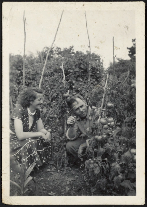 Frank Sargeson in the garden of his Takapuna home, Auckland, with Christine Cole