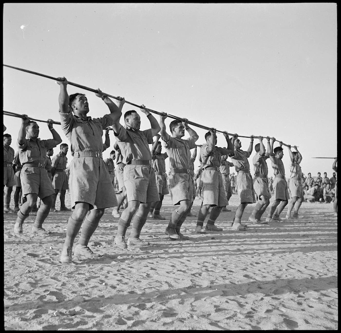 Maori Battalion performing a haka for the King of Greece, at Helwan, Egypt, during World War 2