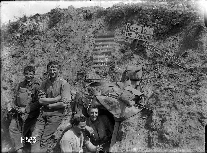 New Zealand soldiers with the 'Cannibals Paradise' sign in World War I, France