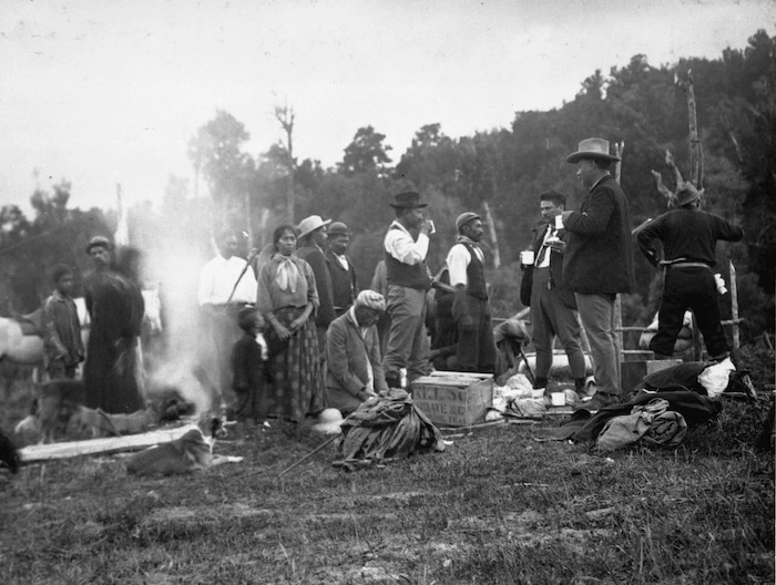 Ross, Malcolm, 1862-1930 :[Lord Ranfurly and party at lunch in a clearing on the Huia-rau Trail]