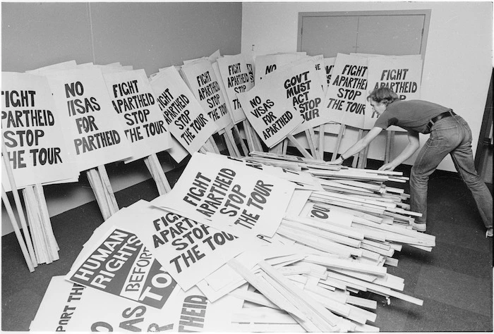 Geoffrey Walker arranging placards for use during an anti-Springbok tour demonstration in Wellington