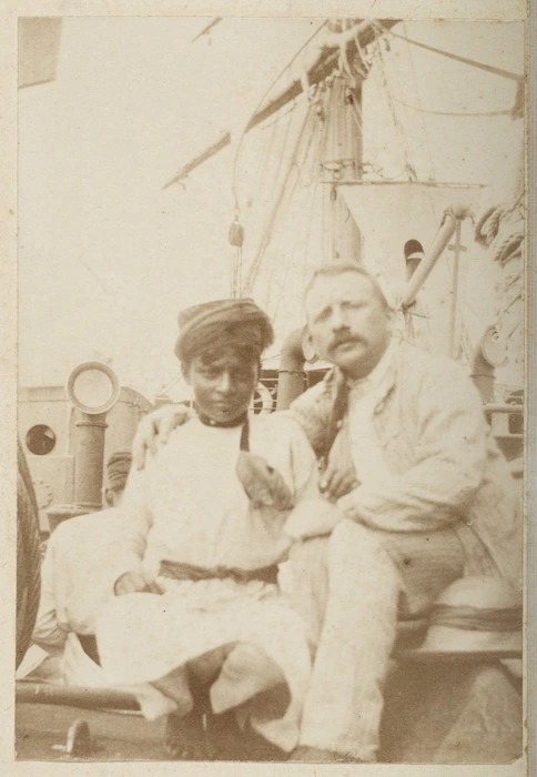 Two men on deck of unidentified ship
