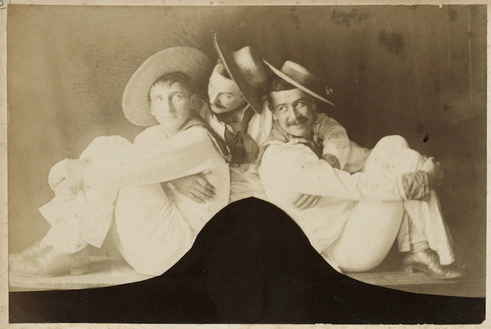 Tableau of three men in sailor suits