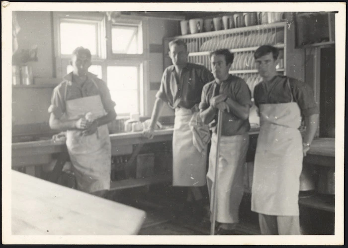 Men inside the kitchen at a detention camp for conscientious objectors