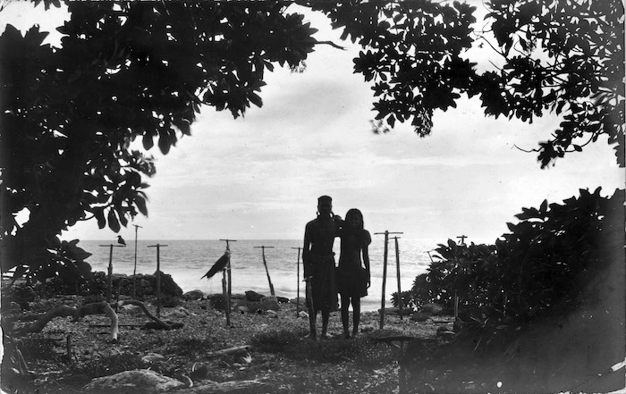 Banaba Islanders and frigate bird, at Banaba, Kiribati