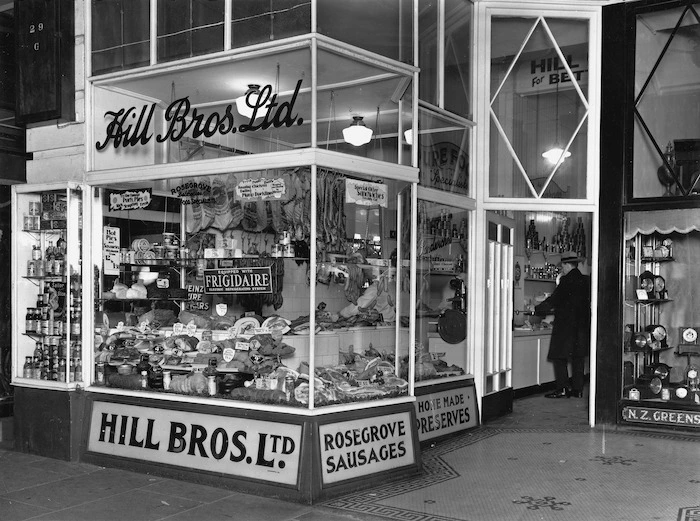 Shop front window of Hill Bros Ltd, grocer, Wellington