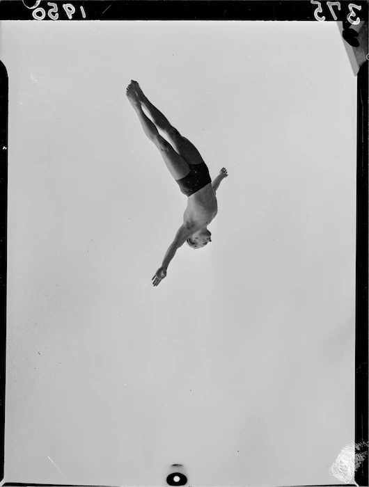 Diver Peter Healey mid-air, 1950 British Empire Games, Auckland
