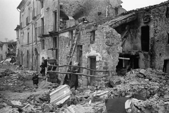 People searching among the ruins of the village of Gessopalena, Italy