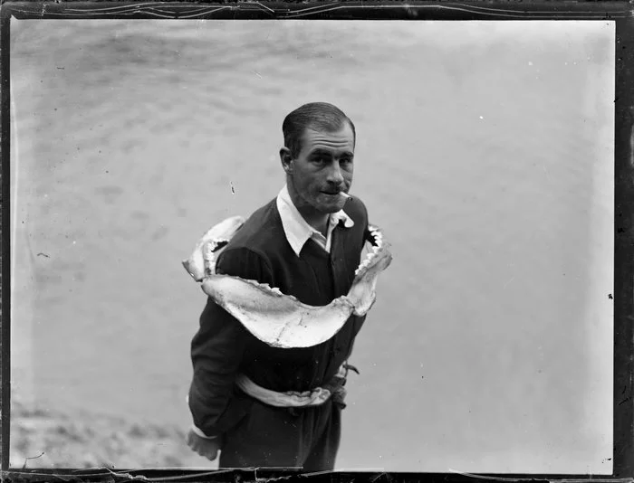 Mr Andreas junior poses with the jaw of a fish around his shoulders