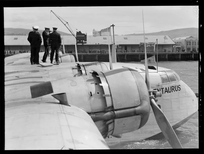 Probably crew members, standing on the flying boat, Centaurus, Dunedin Harbour