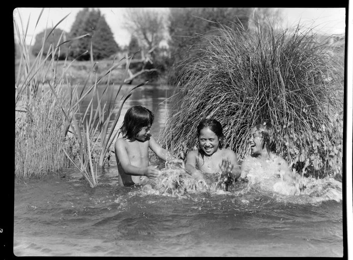 Maori children playing in the river, Waikato