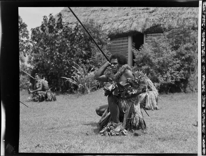 Male dancer with a long spear at the meke, Lautoka, Fiji