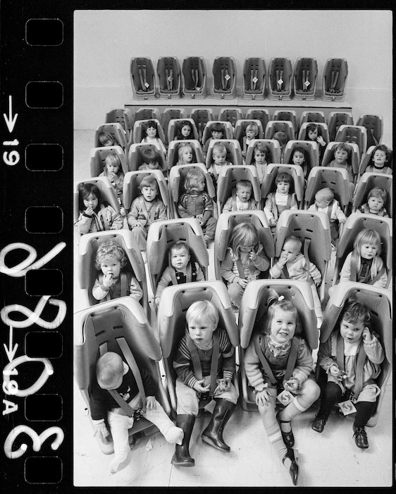 Children in car seats that were donated to the Plunket Society by James Smith's department stores