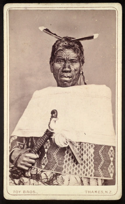 Foy Brothers (Thames) :Unidentified Maori man wearing huia feathers, Thames district