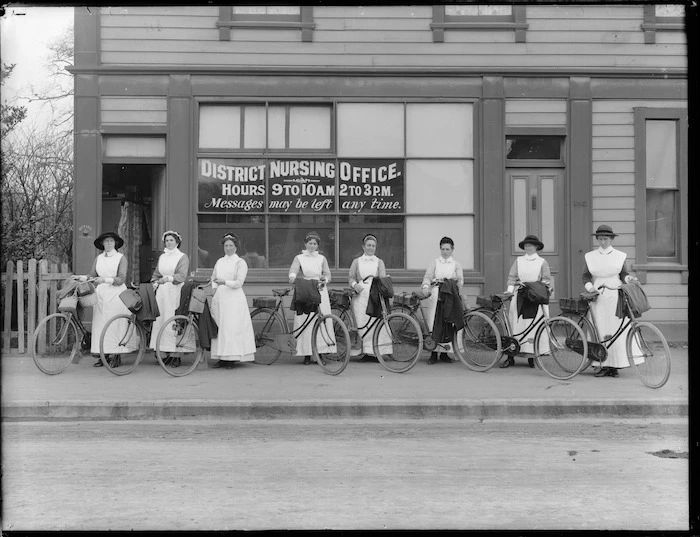 District nurses, with their bicycles, outside South Durham St District Nursing Office, Christchurch