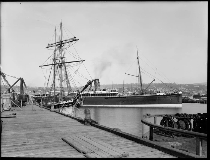 Steam ship Mararoa, at wharves in Dunedin, including a sailing ship moored alongside