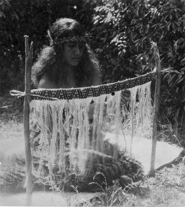 Maori woman weaving taniko