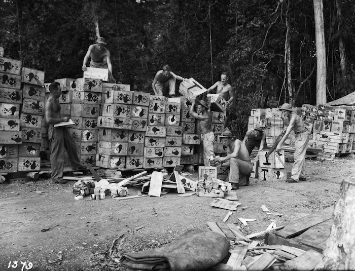 New Zealand soldiers opening boxes of supplies