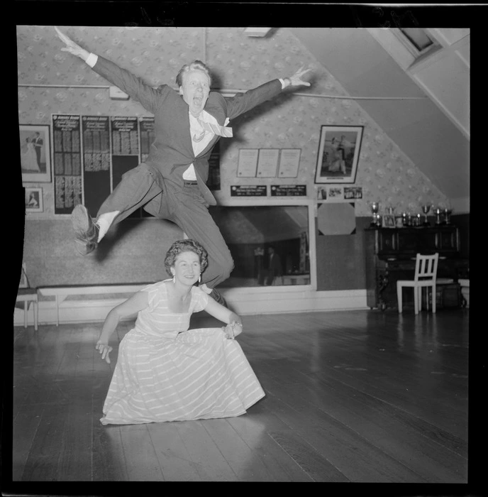 Mr Milton Mitchell and Mrs Jimmy James demonstrating rock & roll dancing, in a dance studio