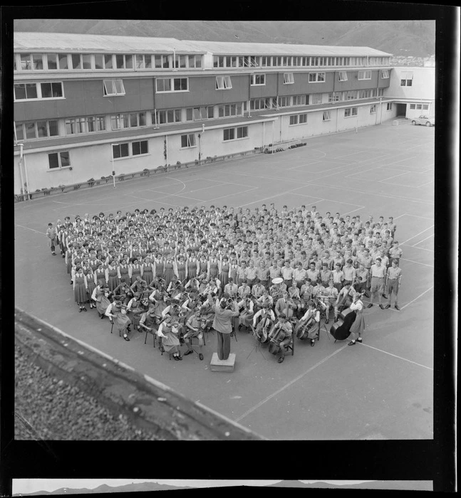 View of Naenae College choir and orchestra in the school grounds, Lower Hutt