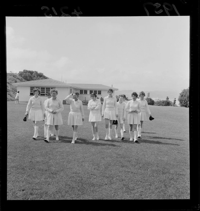 A women's cricket team, at a sportsground in Wellington