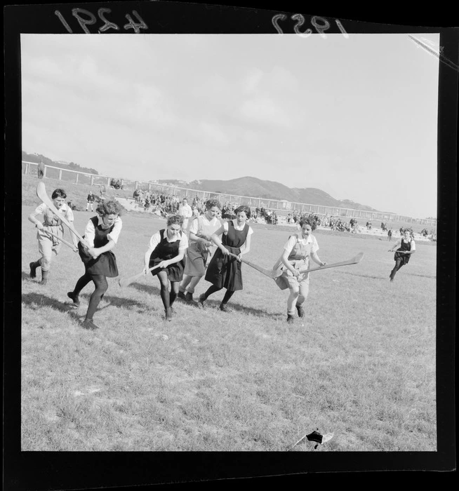 Irish female camogie team playing at an unidentified sportsground at Labour Day weekend