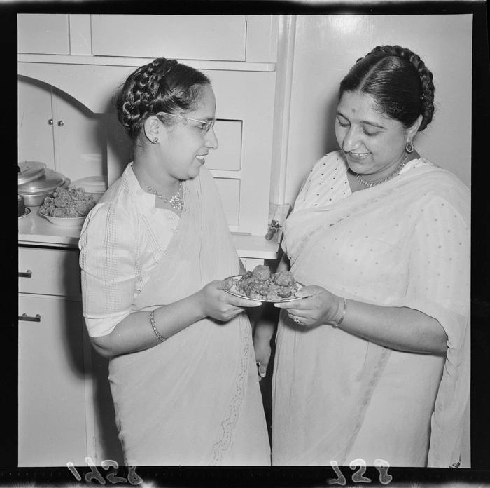 Unidentified women preparing Indian food