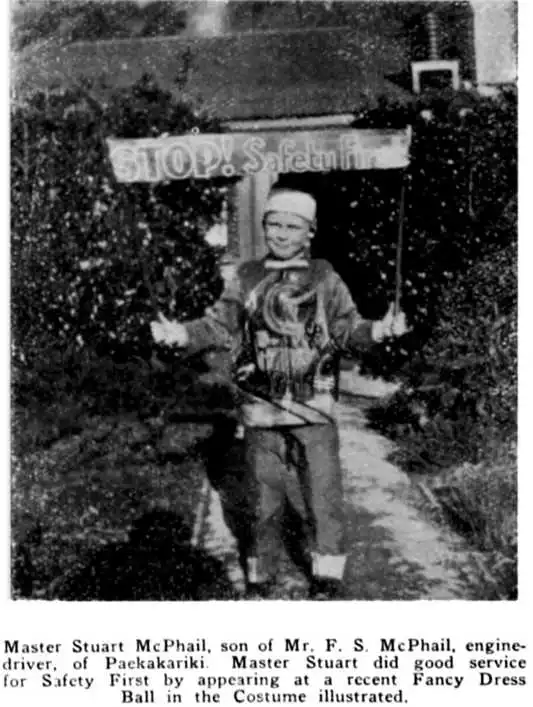 Master Stuart McPhail, son of Mr. F. S. McPhail, engine-driver, of Paekakariki. Master Stuart did good service for safety First by appearing at a recent Fancy Dress Ball in the Costume illustrated