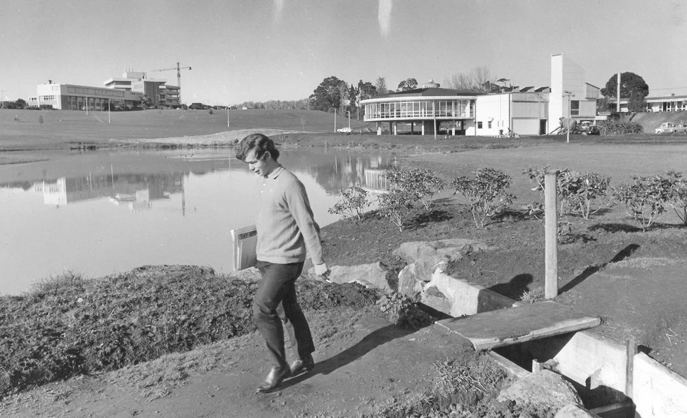 Student walking past Oranga Lake