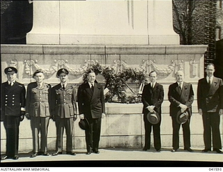 Montreal, Canada. 1948-04-25. Official representatives at the Montreal Cenotaph for an ANZAC Day ceremony in tribute for Australians and New Zealanders killed in both World Wars. They are, from the ..