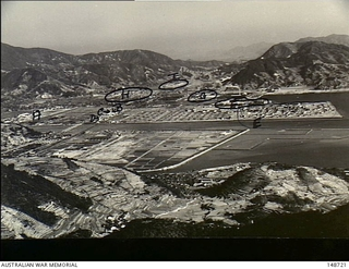 Hiro, Japan. 1953. An elevated view of Allied forces bases in Hiroshima prefecture. Identified are: A. HQ Australian Army Component and 25 Canadian Reinforcement Group area; B. Australian Army ..