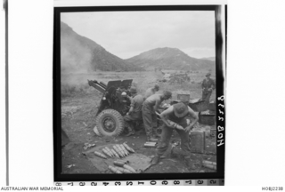 Korea. c 1951. A battery of New Zealand 25 pounder (Mark II) guns gives artillery support to a 3rd Battalion, The Royal Australian Regiment (3RAR) reconnaissance, in force across the Imjin River.  ..